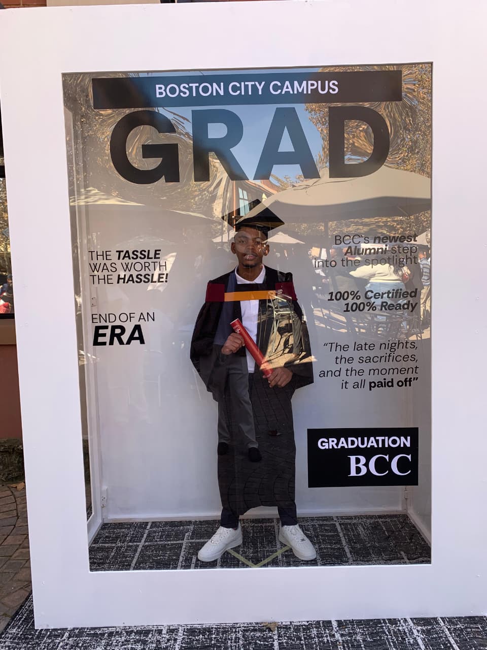 Posing at the Boston City Campus graduation photo booth