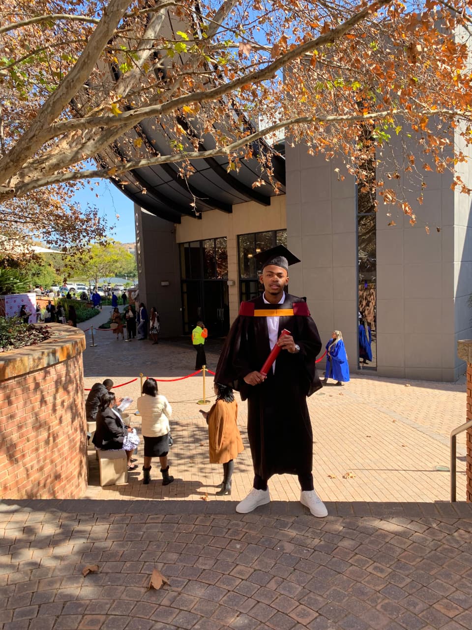 Avuyile Mthembu in full graduation regalia — Tuesday, 26 May 2026